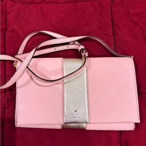 Kate Spade Pink Saffiano - leather body and a metallic gold center stripe